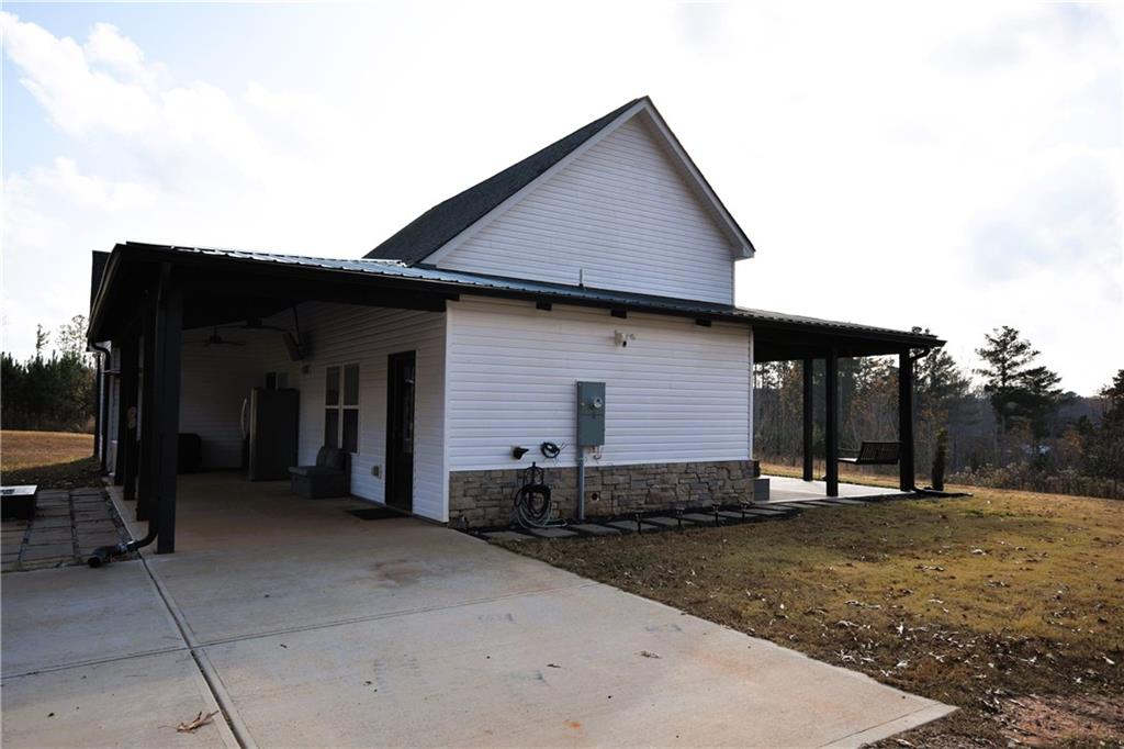 533 Lively Road Waco, GA 30182 - Photo 9 of 41 a front view of a house with barbeque