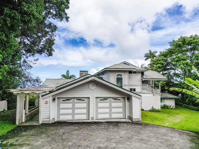 2107 Kaiwiki Road Hilo, HI 96720 - Photo 4 of 30 a view of a house with a yard and large tree