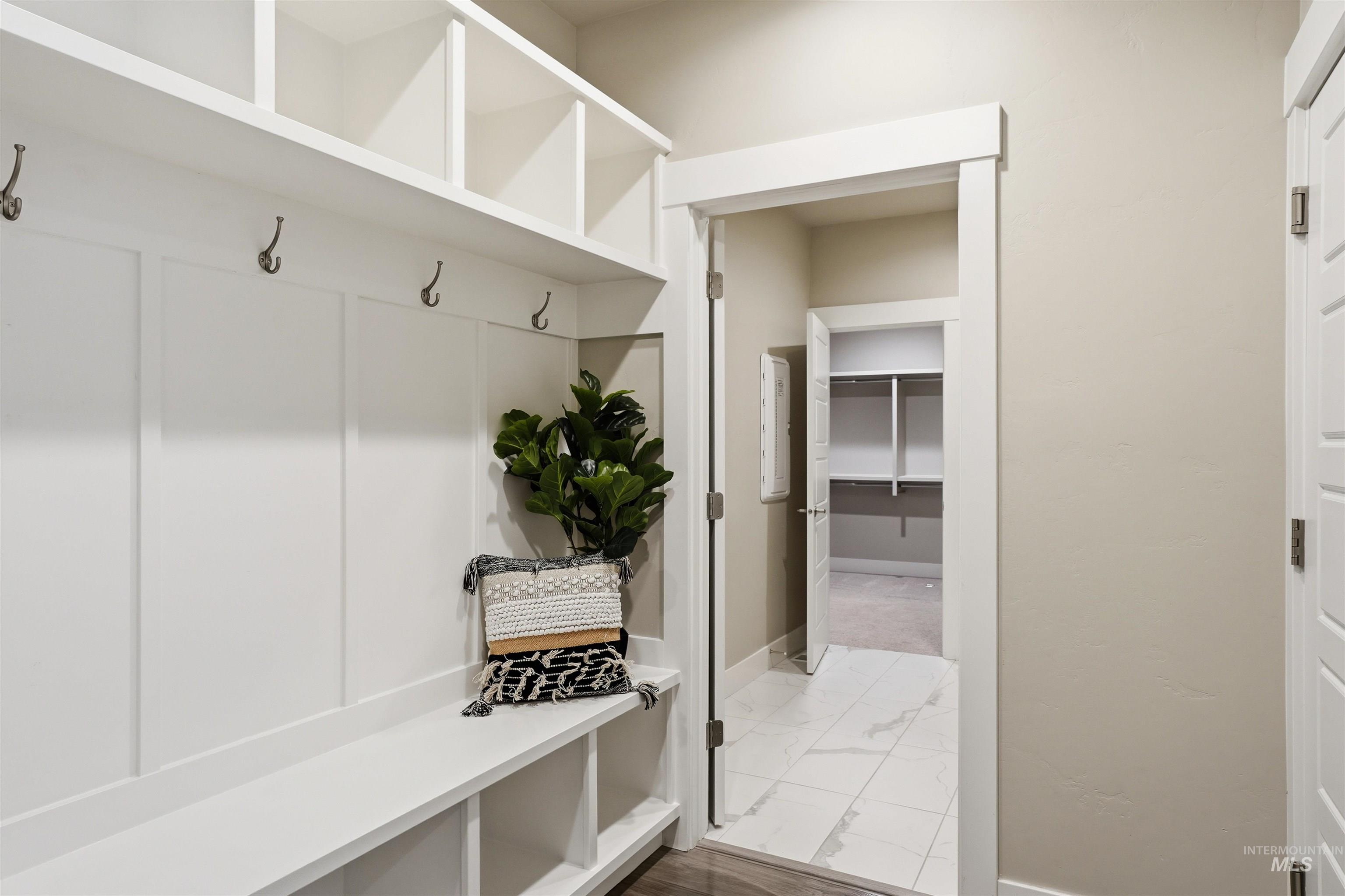 8087 Tandy Cove Street Middleton, ID 83644 - Photo 35 of 50 Mudroom featuring baseboards and light marble finish flooring