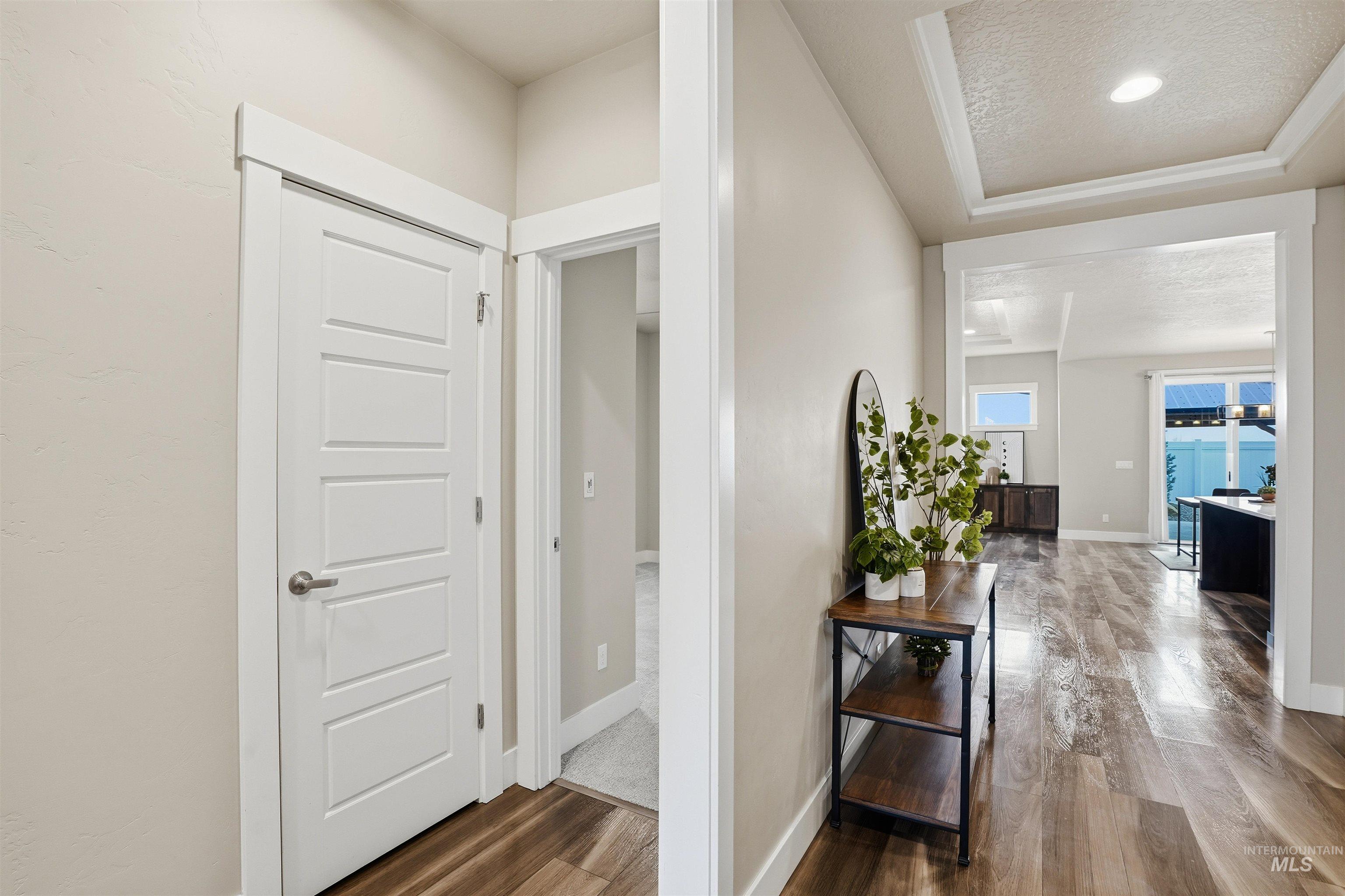 8087 Tandy Cove Street Middleton, ID 83644 - Photo 4 of 50 Hall featuring wood finished floors, recessed lighting, and a textured ceiling