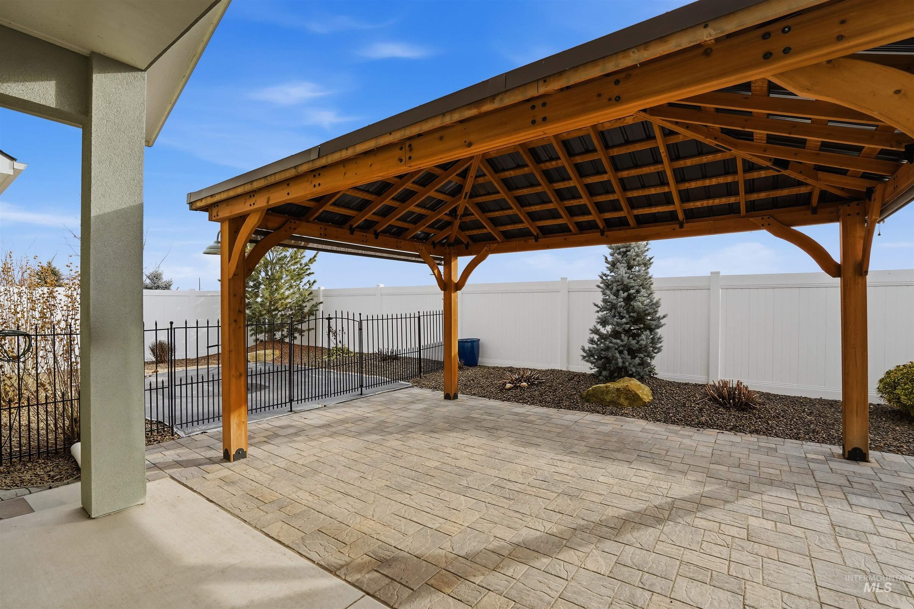 8087 Tandy Cove Street Middleton, ID 83644 - Photo 40 of 50 Fenced backyard with a patio area and a gazebo