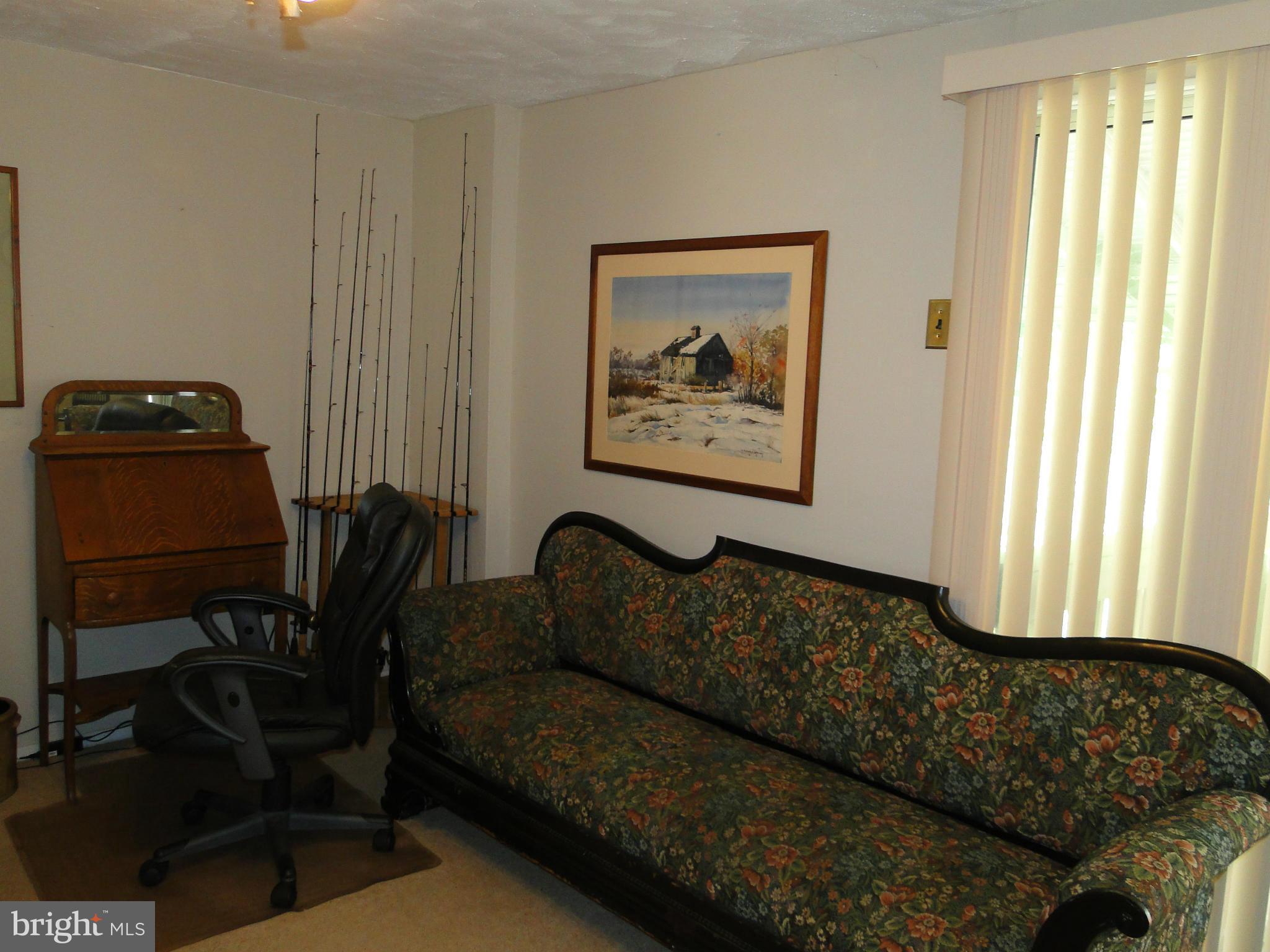 8419 Oakleigh Road Baltimore, MD 21234 - Photo 14 of 30 a living room with furniture and a window