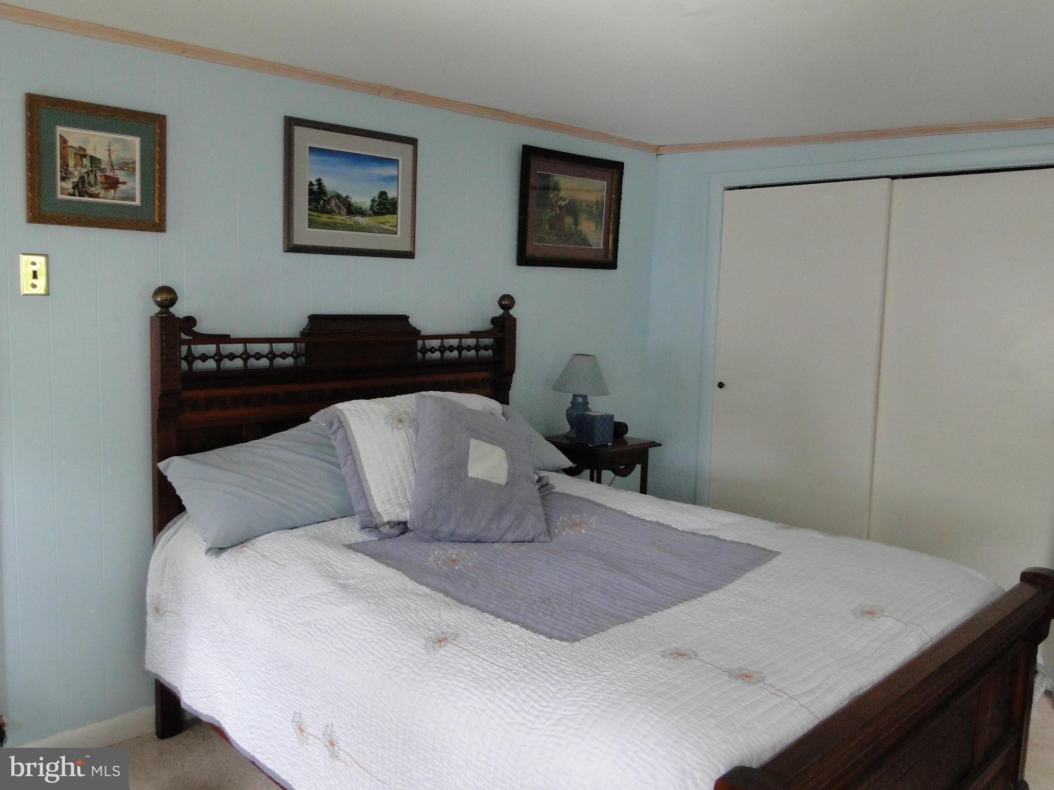 8419 Oakleigh Road Baltimore, MD 21234 - Photo 24 of 30 a view of a bedroom with a bed