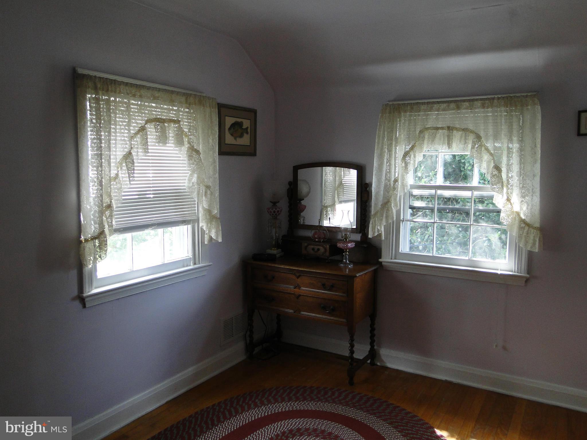 8419 Oakleigh Road Baltimore, MD 21234 - Photo 26 of 30 a room with furniture and a window