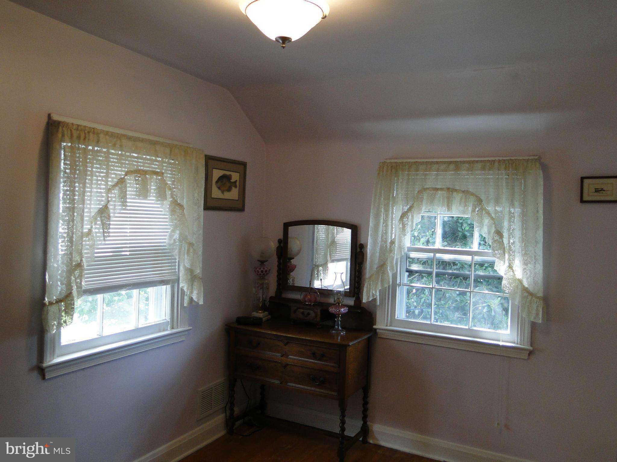 8419 Oakleigh Road Baltimore, MD 21234 - Photo 29 of 30 a living room with furniture and a window