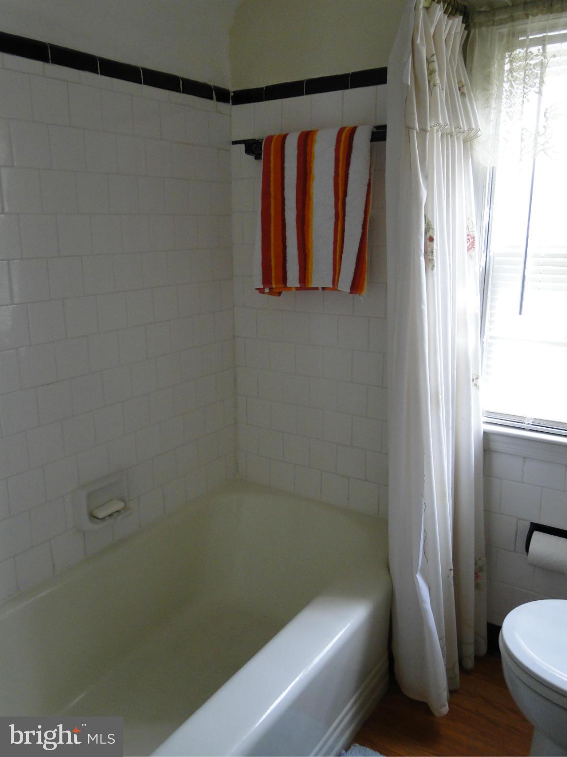 8419 Oakleigh Road Baltimore, MD 21234 - Photo 30 of 30 a bathroom with a toilet and a shower