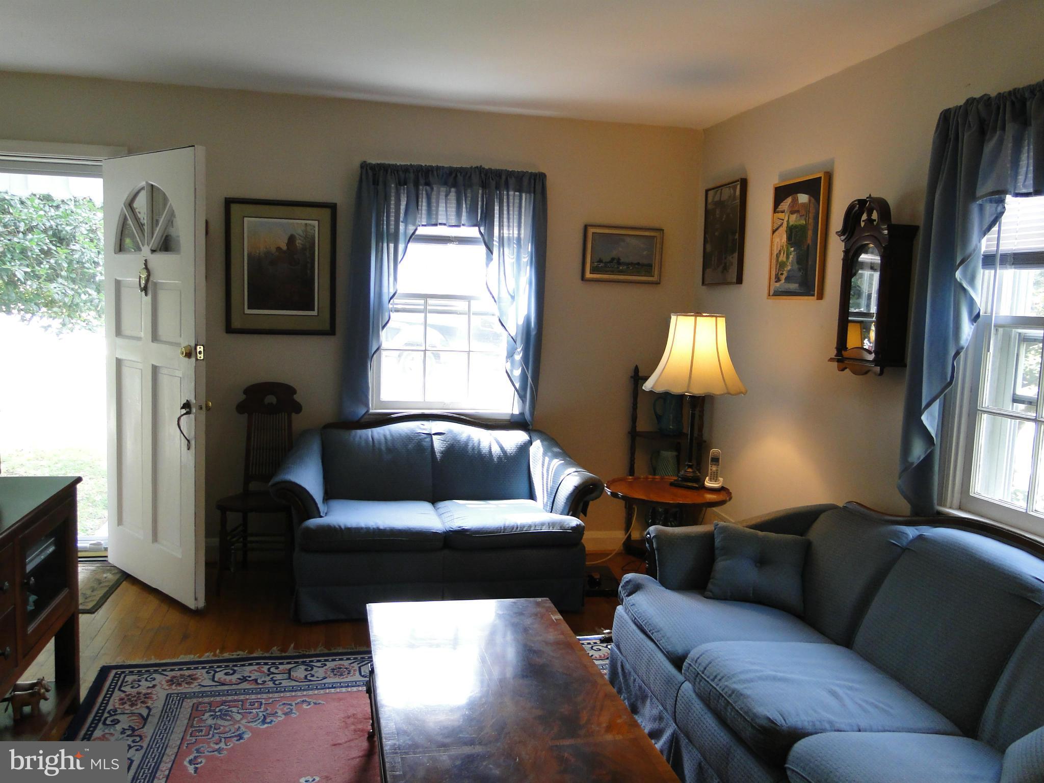 8419 Oakleigh Road Baltimore, MD 21234 - Photo 8 of 30 a living room with furniture and a window