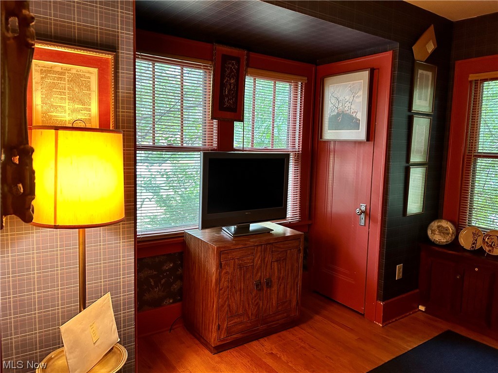 2920 Kent Road Silver Lake, OH 44224 - Photo 11 of 28 First floor office with sitting room and window treatments.