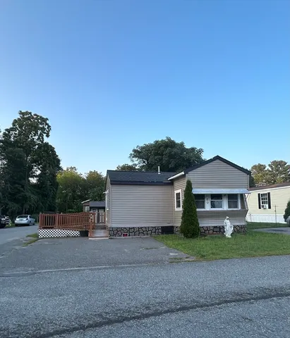 a house view with a garden space