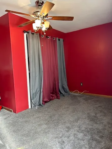 a view of a room with painted walls