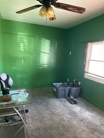 a room with furniture and window