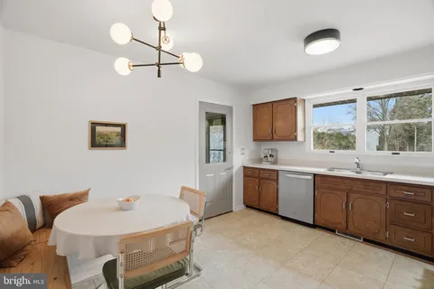 a room with sink and window