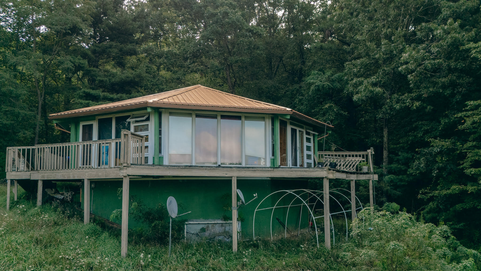 a backyard of a house with seating space