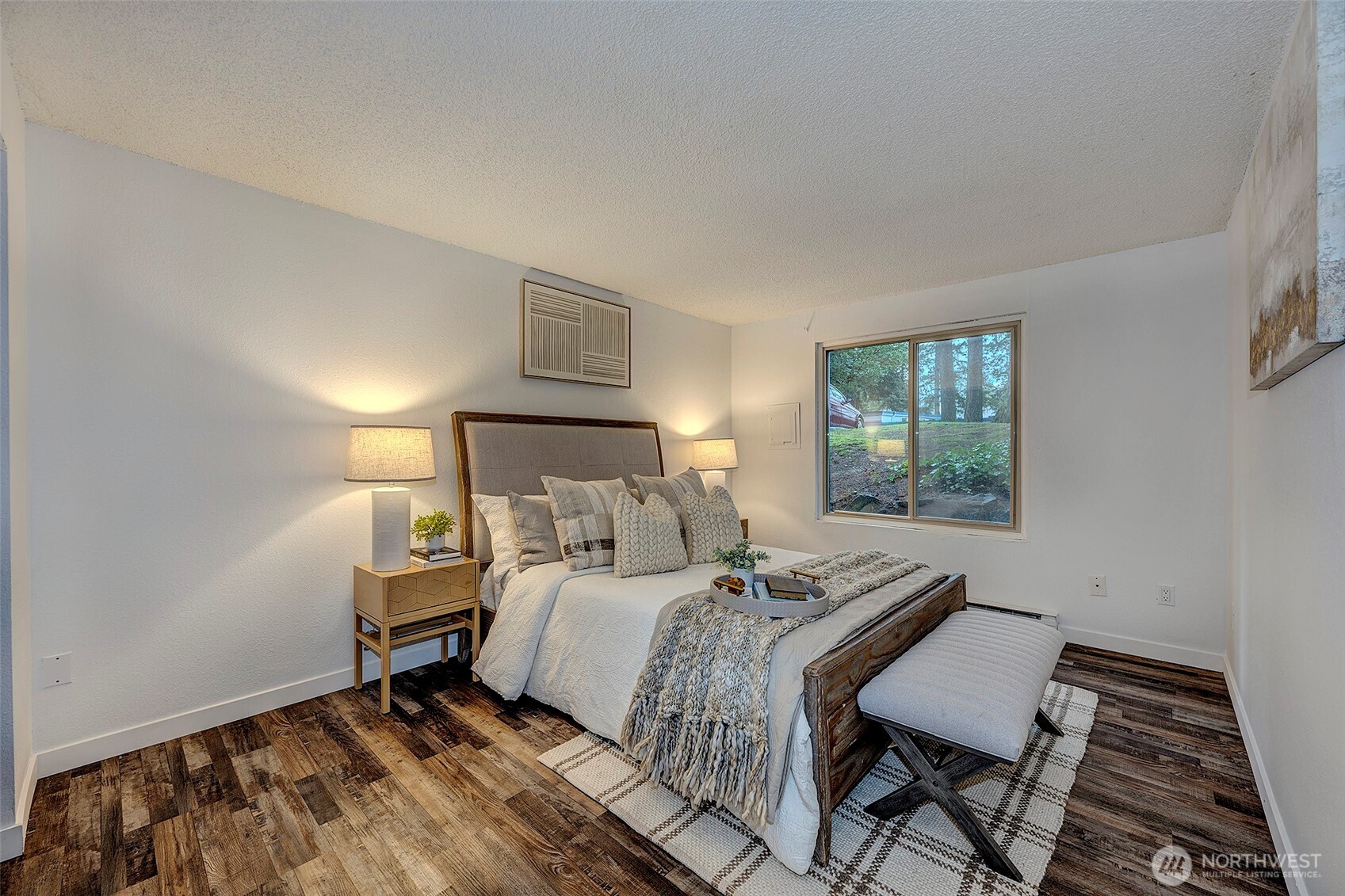 4308 Northeast Sunset Boulevard, Unit P1 Renton, WA 98059 - Photo 11 of 20 a bedroom with a bed and a window