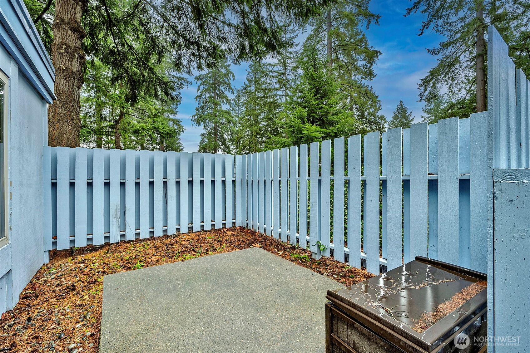 4308 Northeast Sunset Boulevard, Unit P1 Renton, WA 98059 - Photo 13 of 20 a view of a wooden fence
