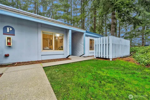 a view of a backyard with garden