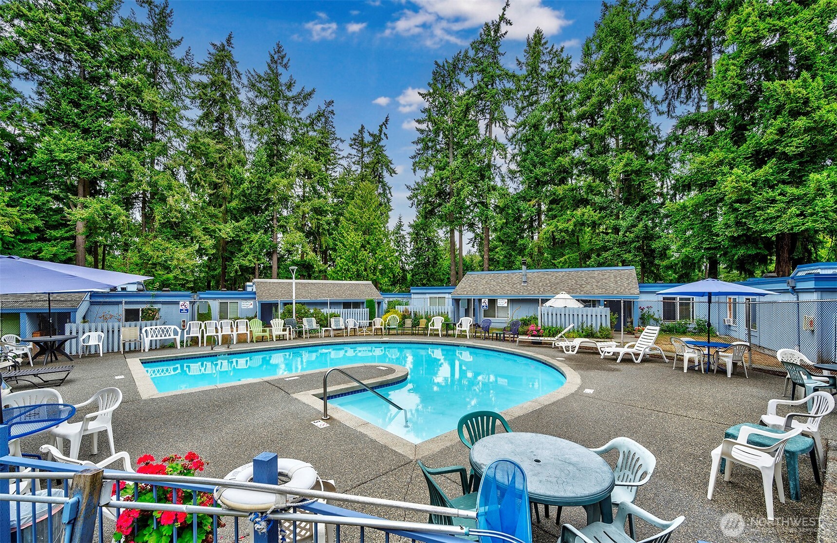 4308 Northeast Sunset Boulevard, Unit P1 Renton, WA 98059 - Photo 18 of 20 a view of swimming pool with outdoor seating