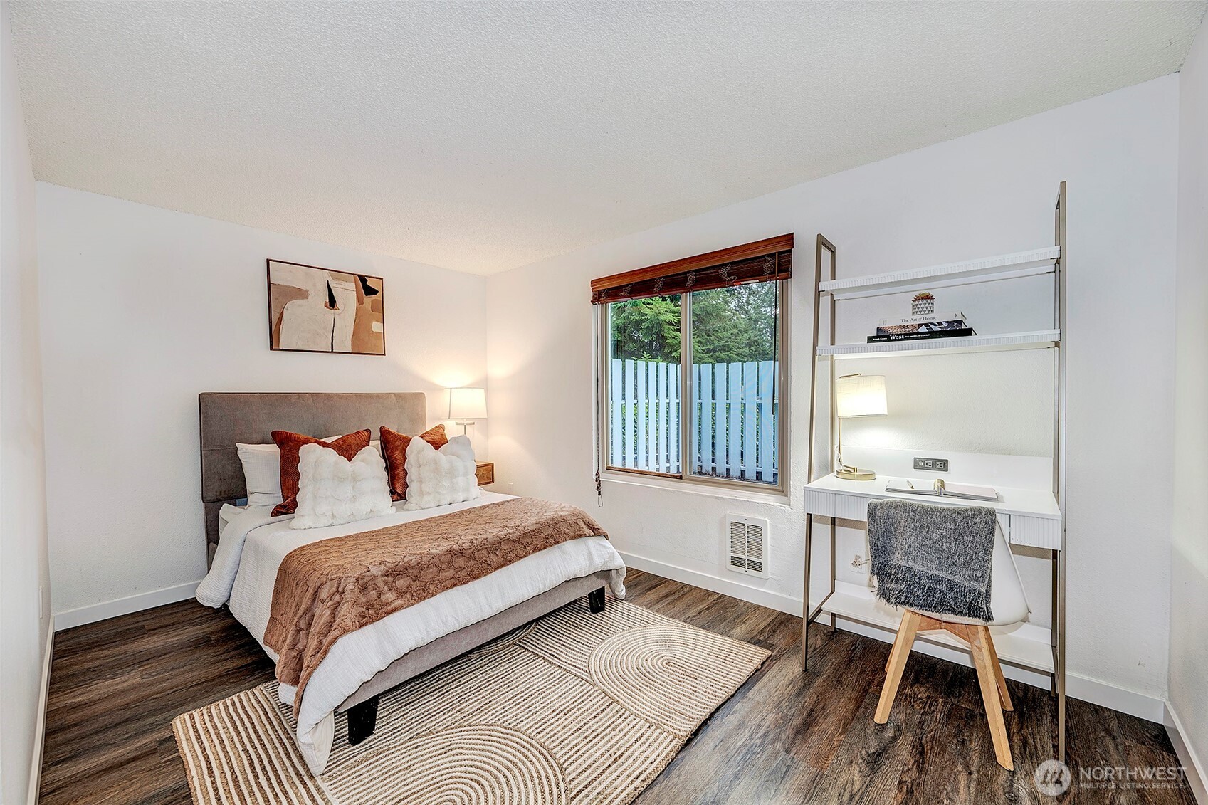 4308 Northeast Sunset Boulevard, Unit P1 Renton, WA 98059 - Photo 7 of 20 a bedroom with a bed and a window