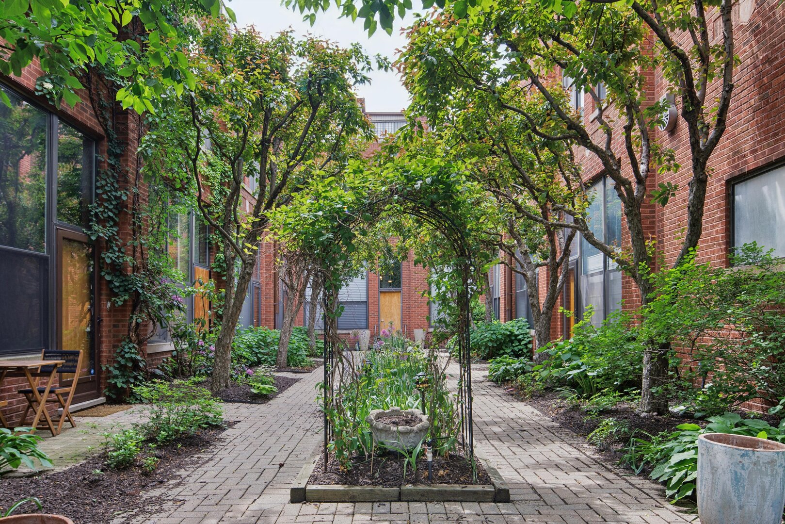 2222 North Racine Avenue, Unit 16 Chicago, IL 60614 - Photo 2 of 32 a view of a garden with plants