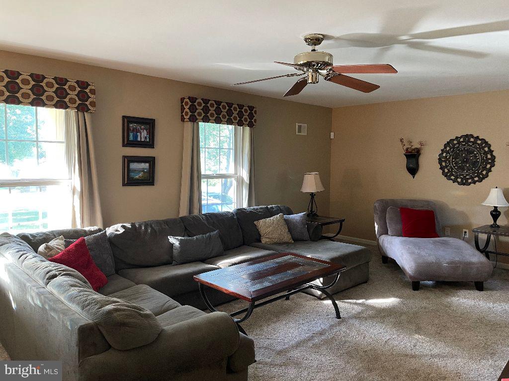 2032 Smoky Road Huntingtown, MD 20639 - Photo 25 of 42 Main level living room, new carpet 2021