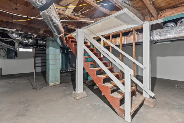 a view of staircase with lots of white walls