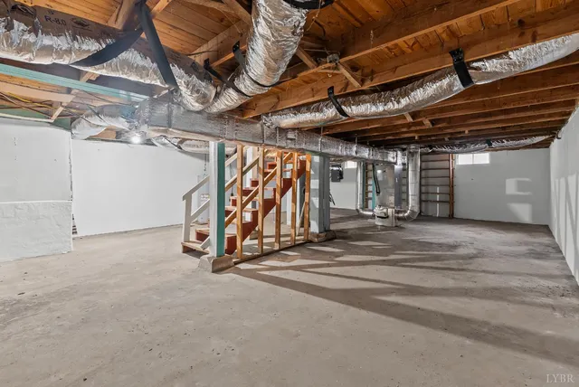 a view of a room with wooden walls