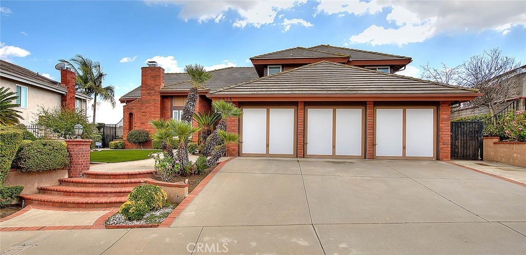 2628 Rudy Street Rowland Heights, CA 91748 - Photo 1 of 1 a front view of a house with garden