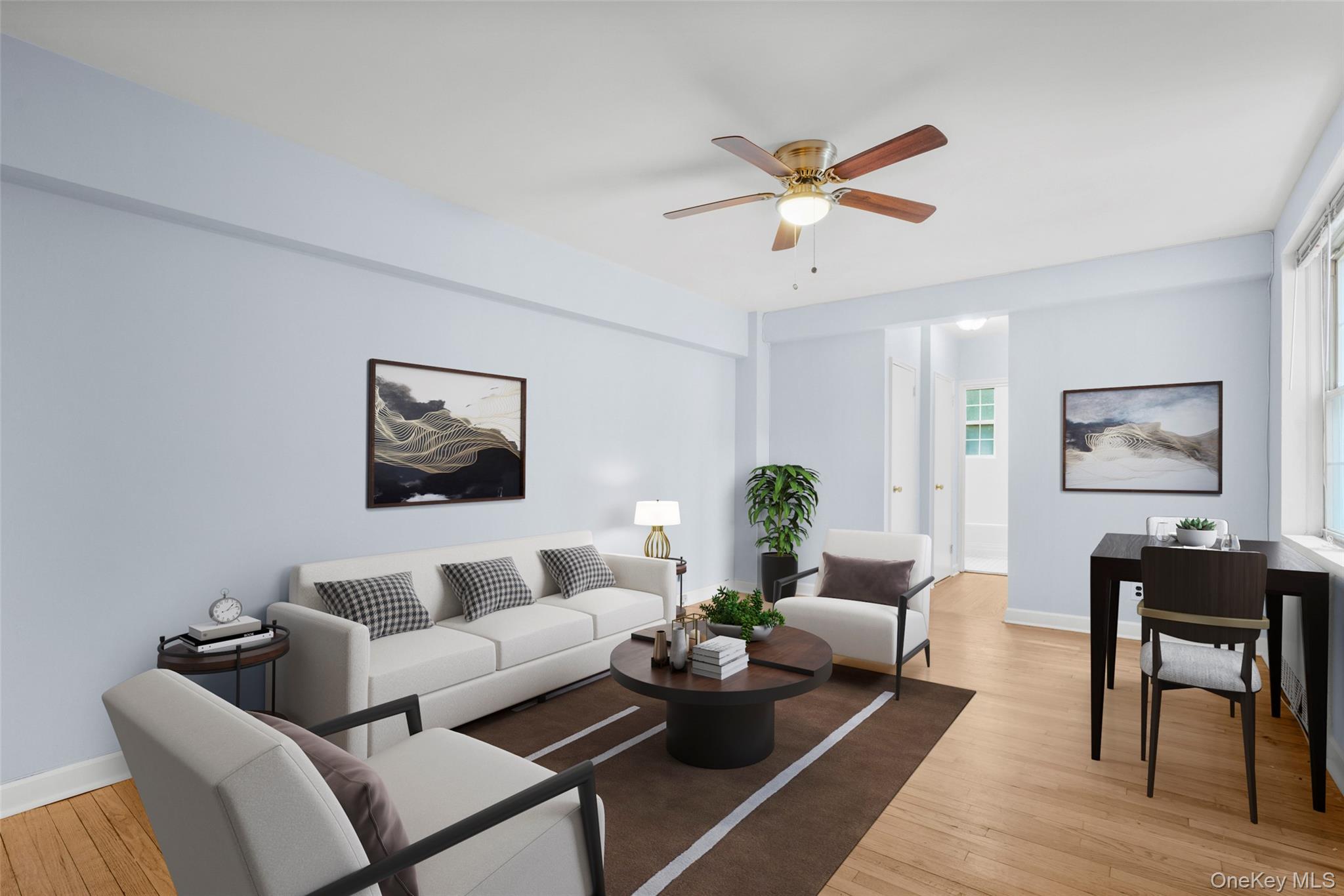 766 Bronx River Road, Unit B18 Bronxville, NY 10708 - Photo 1 of 1 a living room with furniture and a wooden floor