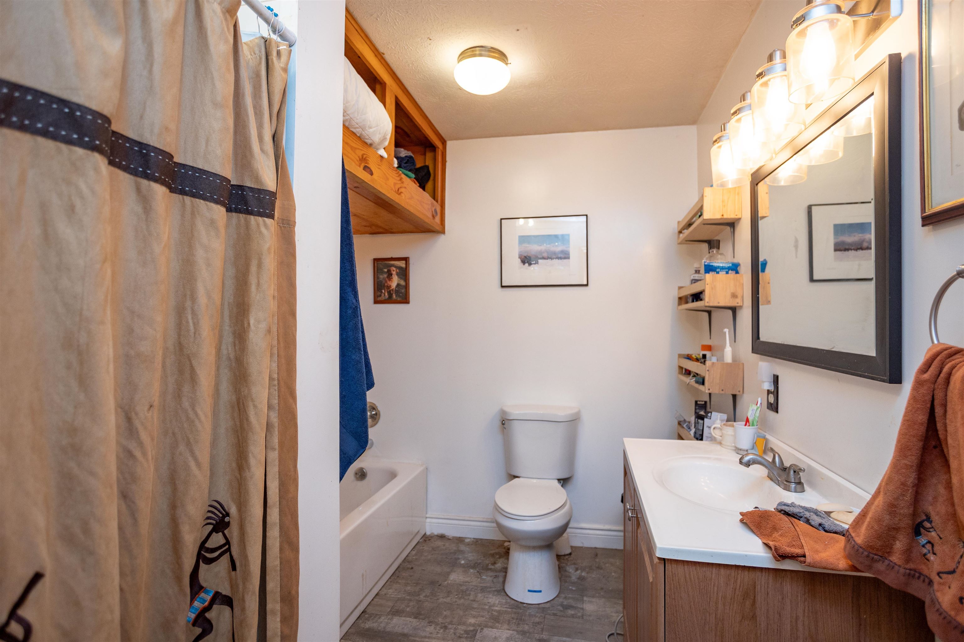 12619 Cardinal Forest Drive Fulks Run, VA 22830 - Photo 13 of 23 a white toilet sitting next to a bathroom sink