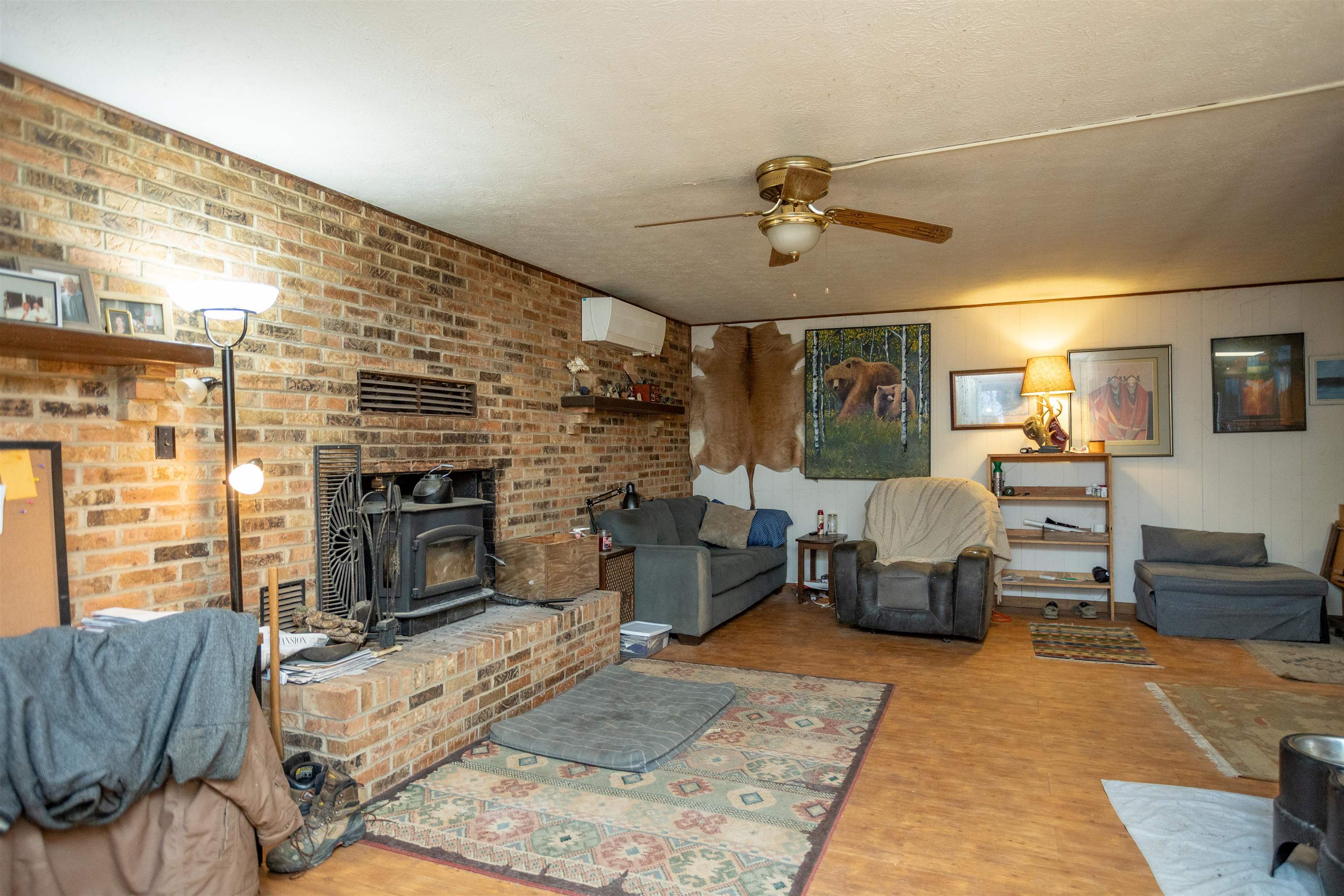 12619 Cardinal Forest Drive Fulks Run, VA 22830 - Photo 4 of 23 a living room with furniture flat screen tv and a fireplace