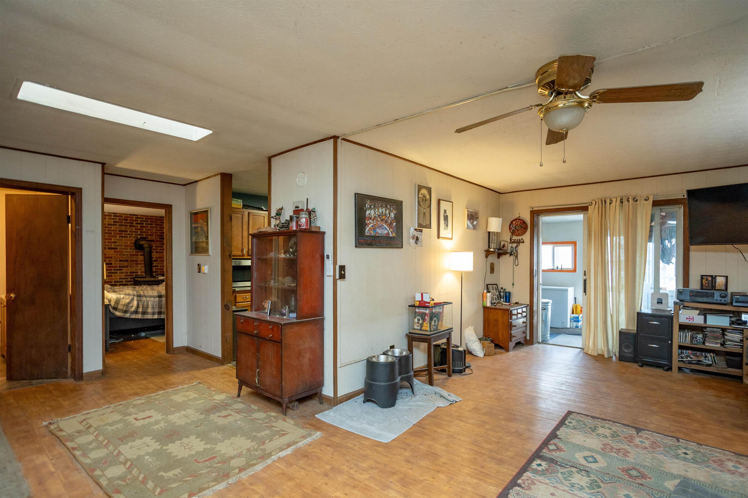 12619 Cardinal Forest Drive Fulks Run, VA 22830 - Photo 6 of 23 a view of a livingroom with furniture and a ceiling fan