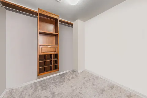 a view of a hallway with bathroom