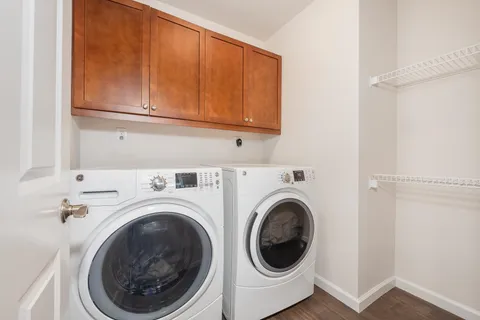 a view of a house with swimming pool and sitting area