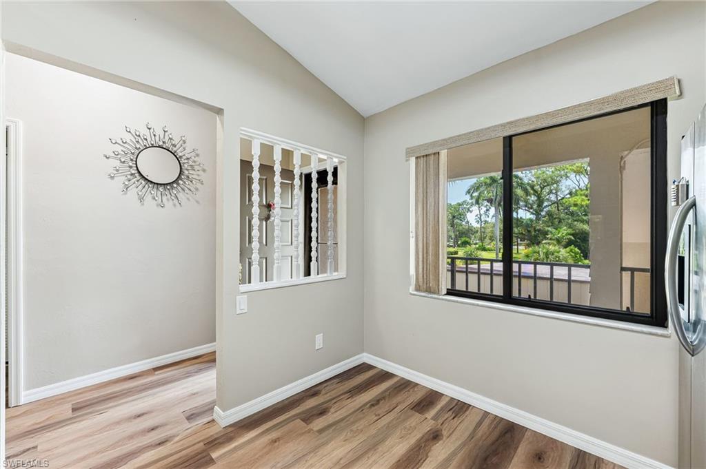 5857 Rattlesnake Hammock Road, Unit 208 Naples, FL 34113 - Photo 12 of 24 a view of empty room with window