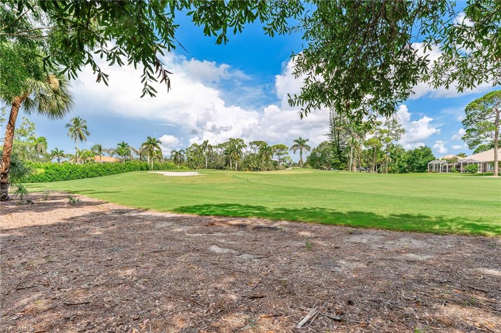 5857 Rattlesnake Hammock Road, Unit 208 Naples, FL 34113 - Photo 24 of 24 a view of a golf course