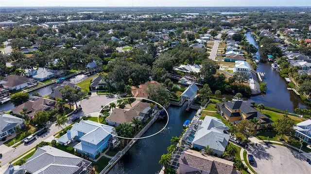 a bedroom with a bed and a dresser in it
