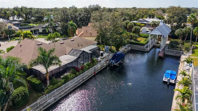 a kitchen with cabinets stainless steel appliances and a counter space