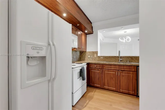 a large bathroom with a granite countertop sink and a mirror