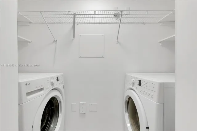 a utility room with dryer and washer