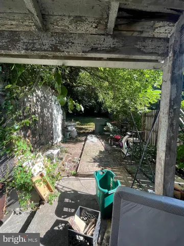 a view of yard with patio