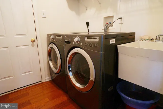 a utility room with dryer and washer