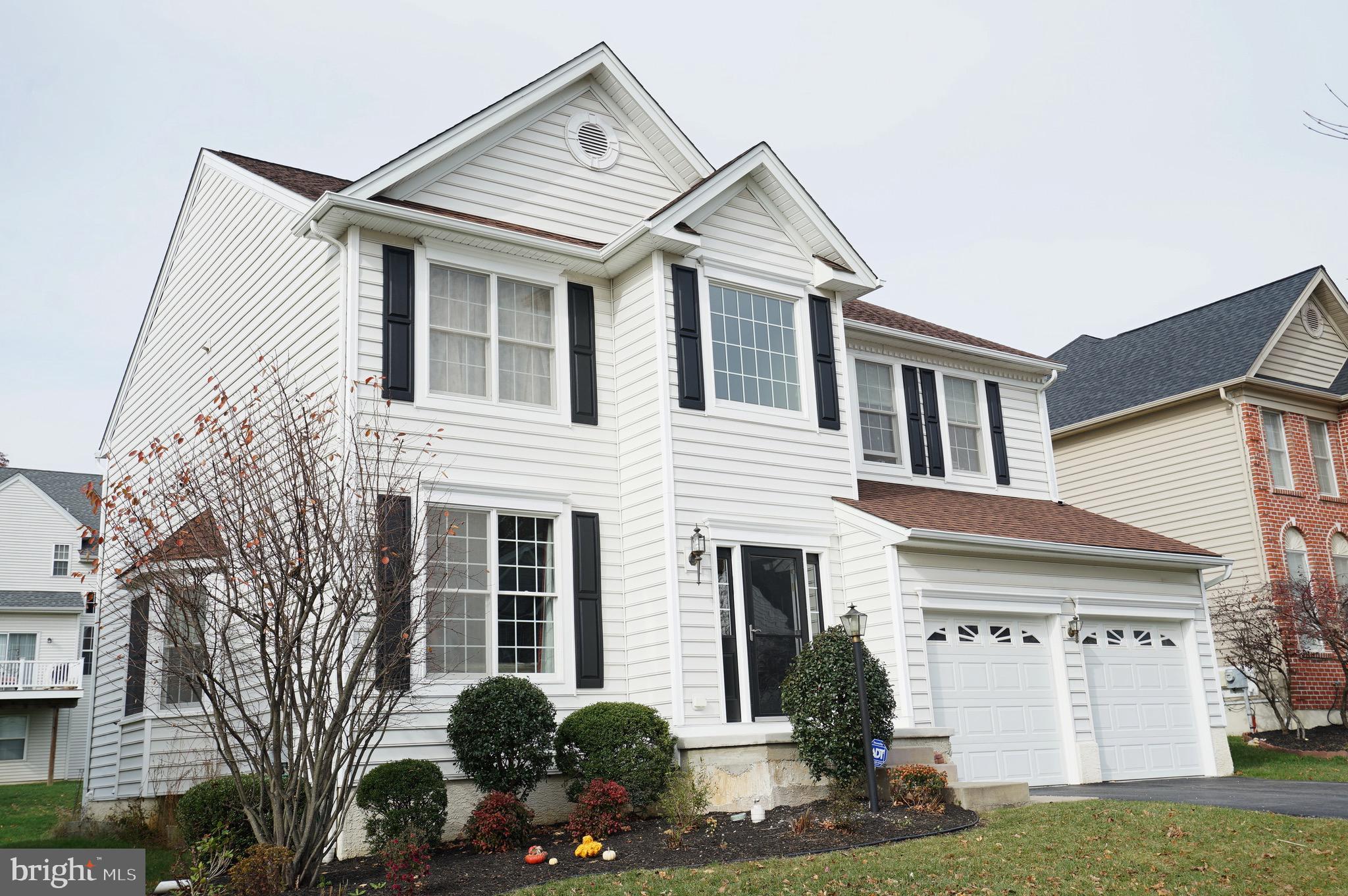 1203 Denton Drive Chester Springs, PA 19425 - Photo 3 of 31 front view of a house with a yard