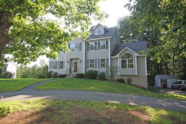 172 Scribner Road Tyngsborough, MA 01879 - Photo 1 of 17 a front view of a house with a yard