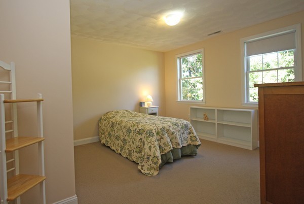 172 Scribner Road Tyngsborough, MA 01879 - Photo 14 of 17 a bedroom with a bed and a window