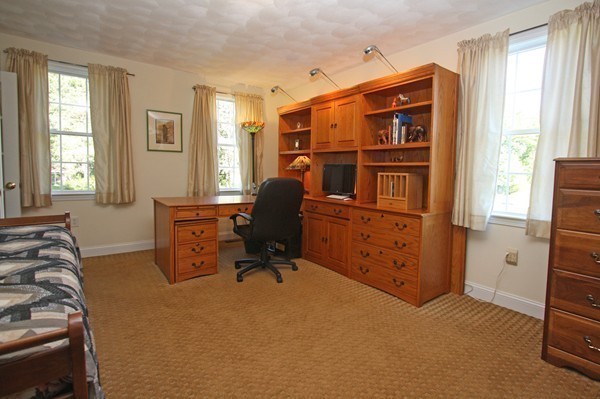 172 Scribner Road Tyngsborough, MA 01879 - Photo 16 of 17 a view of a workspace with furniture and a window