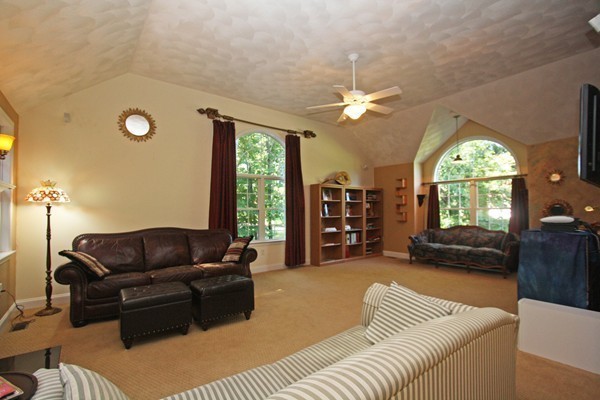172 Scribner Road Tyngsborough, MA 01879 - Photo 7 of 17 a living room with furniture and a large window