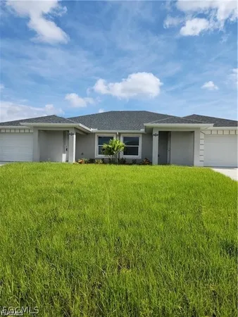 a house view with a garden space