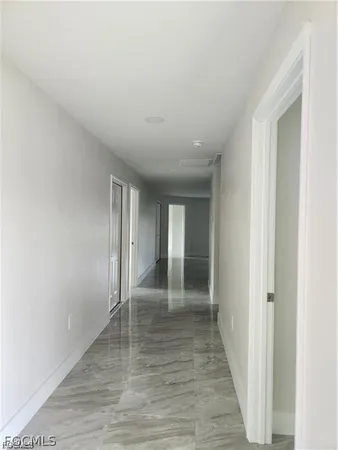 a view of kitchen with wooden floor