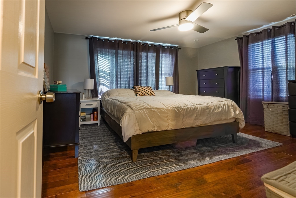 142 Norman Street Fall River, MA 02721 - Photo 12 of 25 a bed sitting in a spacious bedroom and balcony