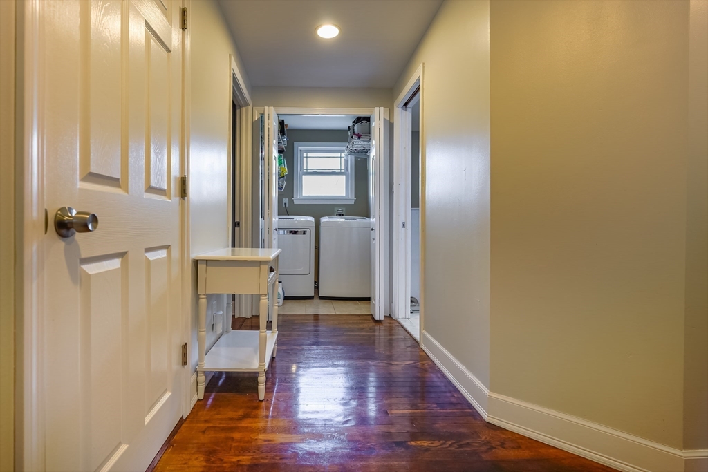 142 Norman Street Fall River, MA 02721 - Photo 15 of 25 a view of a room with wooden floor table and chairs